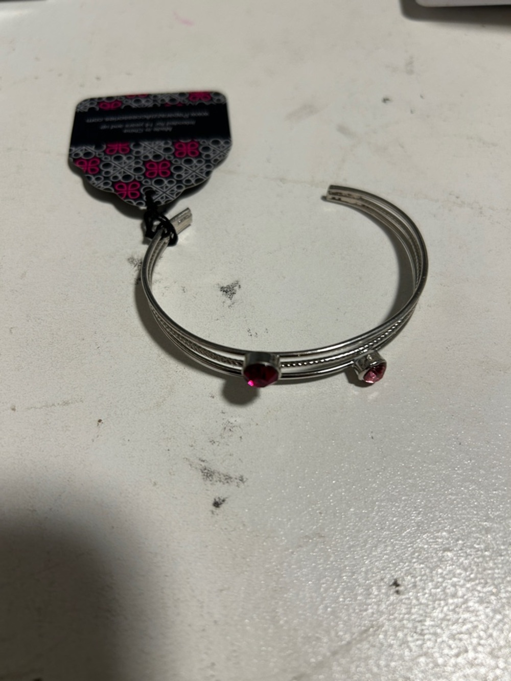 Silver-Tone Open Bangle Bracelet with Pink Stone Accents